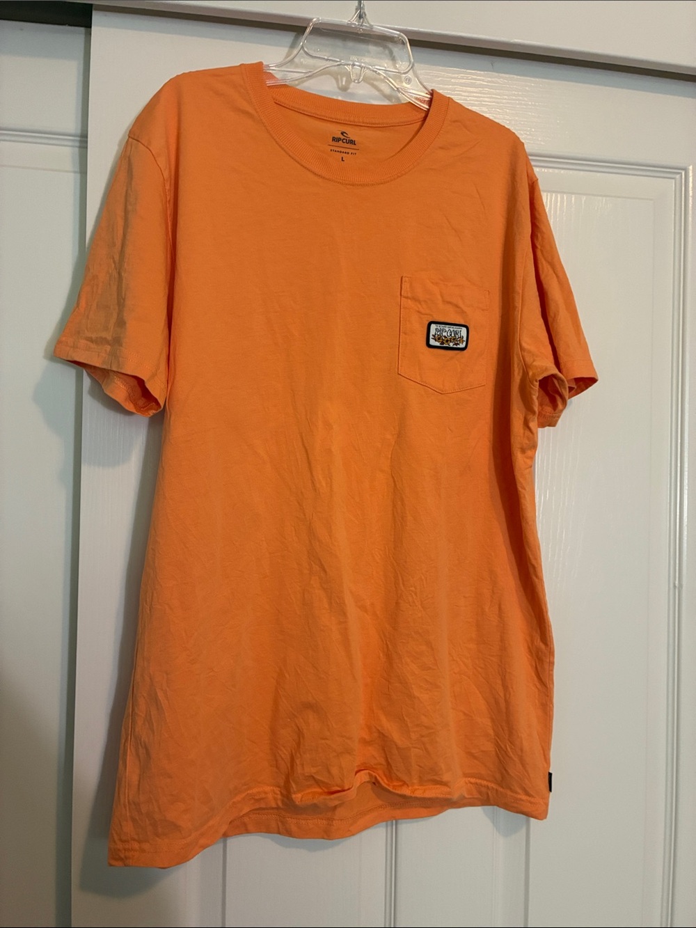 VTG Rip Curl Men’s Bright Orange Short Sleeve Pocket Tee w/ cool patch on pocket